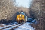 Q425 climbs upgrade through the woods west of Huntington 